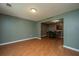 Spacious dining room featuring wood-look flooring, neutral paint, and an open design at 311 Aberdeen Cir, Summerville, SC 29483