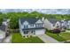 Charming two-story home boasts a well-manicured lawn, attached two-car garage, and beautiful curb appeal at 311 Aberdeen Cir, Summerville, SC 29483