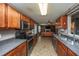 Kitchen with stainless steel appliances, granite countertops, and view into the living room at 311 Aberdeen Cir, Summerville, SC 29483