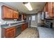 Well-lit kitchen features stainless appliances, granite counters, and abundant cabinet space at 311 Aberdeen Cir, Summerville, SC 29483