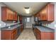 Well-lit kitchen features stainless appliances, granite counters, and abundant cabinet space at 311 Aberdeen Cir, Summerville, SC 29483