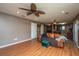 Bright and open living room featuring hardwood floors and access to the kitchen and dining area at 311 Aberdeen Cir, Summerville, SC 29483