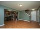 Spacious living room featuring laminate wood flooring, neutral paint, and an open design at 311 Aberdeen Cir, Summerville, SC 29483