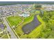 An aerial view of a community pool and other recreational amenities surrounded by well-maintained landscaping at 330 Ripple Park Dr, Summerville, SC 29486