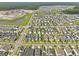 Aerial view of a community with single-Gathering homes, ponds, and green spaces at 330 Ripple Park Dr, Summerville, SC 29486