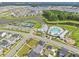 Aerial view of community amenities, including a pool, clubhouse, and tennis courts at 330 Ripple Park Dr, Summerville, SC 29486