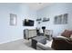 Bright and airy bedroom with a clean, modern aesthetic and comfortable seating area at 330 Ripple Park Dr, Summerville, SC 29486