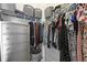 Organized walk-in closet features shelving, hanging rods, and storage baskets for maximum storage capacity at 330 Ripple Park Dr, Summerville, SC 29486
