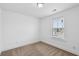 A bright bedroom featuring neutral carpet and a window providing natural light at 3927 Four Poles Park Dr, North Charleston, SC 29405