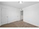 A bright bedroom with neutral carpet and a white door leading to the closet at 3927 Four Poles Park Dr, North Charleston, SC 29405