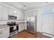 Well-equipped kitchen featuring stainless steel appliances and gray cabinets at 3927 Four Poles Park Dr, North Charleston, SC 29405