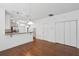 Spacious open living area featuring hardwood floors and view into the kitchen at 3927 Four Poles Park Dr, North Charleston, SC 29405