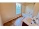 Bathroom featuring tub shower combo, single sink vanity and a bright window at 412 Beverly Dr, Summerville, SC 29485