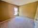 Bedroom with neutral carpet, natural light, and a window with curtains at 412 Beverly Dr, Summerville, SC 29485