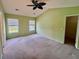 Spacious bedroom featuring vaulted ceiling, two windows, and an adjoining closet at 412 Beverly Dr, Summerville, SC 29485