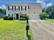 Charming two-story home with a well-manicured lawn and traditional curb appeal at 412 Beverly Dr, Summerville, SC 29485