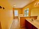 Functional laundry room with sink, window, and storage space at 412 Beverly Dr, Summerville, SC 29485