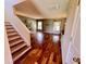 Open living room area featuring hardwood floors and a staircase at 412 Beverly Dr, Summerville, SC 29485