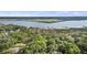 Aerial view of waterfront neighborhood with green trees and dock at 4601 Apple St, North Charleston, SC 29405