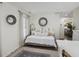 Cozy bedroom features a daybed with decorative pillows, offering a relaxing and inviting space at 4601 Apple St, North Charleston, SC 29405