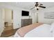 Comfortable main bedroom with TV and dresser, creating a cozy retreat within the home at 4601 Apple St, North Charleston, SC 29405