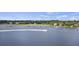 Beautiful waterfront scene featuring a passing boat with lush trees along the coast at 4601 Apple St, North Charleston, SC 29405