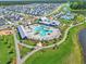 Stunning aerial view of community amenities, including a resort-style pool and clubhouse at 501 Rhythm St, Summerville, SC 29486