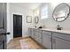 Bright bathroom with double vanity, modern mirrors, stylish fixtures, and attractive flooring at 501 Rhythm St, Summerville, SC 29486