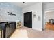 Stylish Bedroom featuring wave wallpaper, a black crib, and a closet at 501 Rhythm St, Summerville, SC 29486