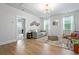 Bright bonus room with a comfortable seating area, natural light, and modern decor at 501 Rhythm St, Summerville, SC 29486