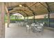 Outdoor pavilion with picnic tables, ping pong, and ample seating, perfect for gatherings at 501 Rhythm St, Summerville, SC 29486