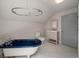 Bathroom featuring a blue soaking tub, stylish vanity, and marble floors at 5152 Coral Reef Dr, Johns Island, SC 29455