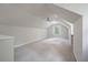Spacious bonus room featuring a charming chandelier, vaulted ceiling, and a cozy window nook at 5152 Coral Reef Dr, Johns Island, SC 29455