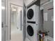 Conveniently stacked LG washer and dryer situated in a dedicated laundry area, optimizing space at 5152 Coral Reef Dr, Johns Island, SC 29455
