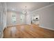 Open living room flows into a kitchen space with white cabinets at 5152 Coral Reef Dr, Johns Island, SC 29455