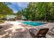 Relaxing community pool with lounge chairs and covered pavilion, perfect for leisure and social gatherings at 5152 Coral Reef Dr, Johns Island, SC 29455