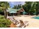 An inviting community pool features a shaded pavilion and plenty of lounging space to enjoy warm days in a relaxed atmosphere at 5152 Coral Reef Dr, Johns Island, SC 29455