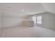 Spacious and bright bonus room with carpeting and natural light from large windows at 545 Verdi Drive Dr, Summerville, SC 29486