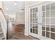 Open entryway with hardwood floors and french doors leading to another room at 545 Verdi Drive Dr, Summerville, SC 29486