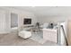 Upstairs loft with plush carpet and a comfy white sofa. A perfect relaxing area at 545 Verdi Drive Dr, Summerville, SC 29486