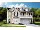 Inviting two story home featuring a double garage and an upper porch at 547 Verdi Drive Dr, Summerville, SC 29486