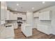 Beautiful white kitchen with stainless steel appliances and an island at 547 Verdi Drive Dr, Summerville, SC 29486