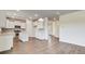 Open-concept kitchen with modern appliances and wood flooring at 547 Verdi Drive Dr, Summerville, SC 29486