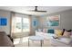 Comfortable living room with neutral colors, bright natural light, and stylish nautical themed artwork at 547 Verdi Drive Dr, Summerville, SC 29486