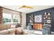 Cozy living room featuring a comfortable sofa, stylish ottomans, and ample natural light at 547 Verdi Drive Dr, Summerville, SC 29486