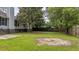 Well maintained lush backyard with mature trees, offering a private outdoor space for relaxation at 600 Dolphin Dr, Summerville, SC 29485