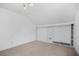 Simple room with built-in shelving and storage, featuring neutral carpet and plain walls at 600 Dolphin Dr, Summerville, SC 29485