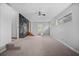 Spacious carpeted living room with natural light and access to outdoor space at 600 Dolphin Dr, Summerville, SC 29485