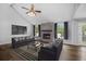 Bright living room with a brick fireplace, vaulted ceiling, and stylish decor at 600 Dolphin Dr, Summerville, SC 29485