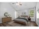 Bright main bedroom with vaulted ceiling, hardwood floors, and neutral decor at 600 Dolphin Dr, Summerville, SC 29485
